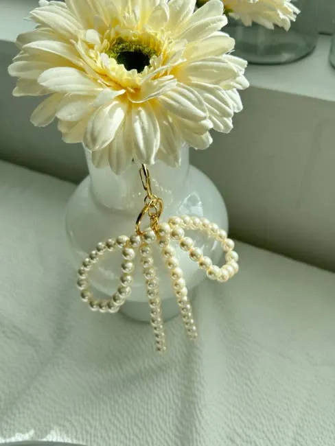 Gold Chubby Pearl Bow Charm Keychain